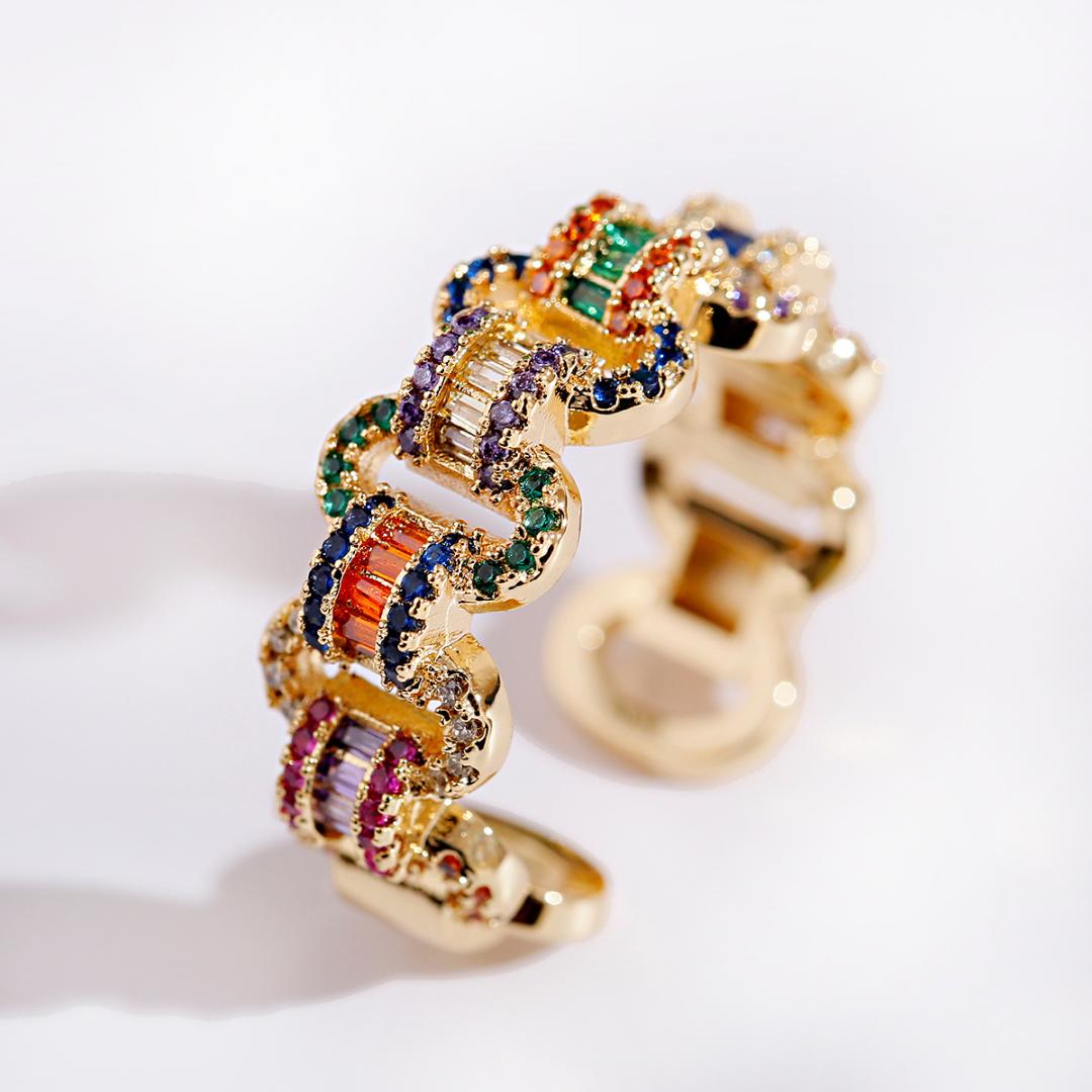 Verstellbarer Ring aus 18K Gold mit farbigen Zirkoniasteinen