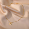 Schöne 18 Karat vergoldete Halskette mit Herz-Initialen